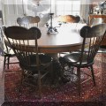 F72. Hastings Table Co. quarter-sawn oak split pedestal dining table. 60"w. Additional leaves included. 